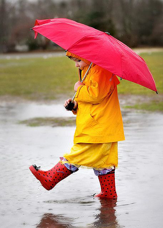Cute Baby Enjoying Rain Images